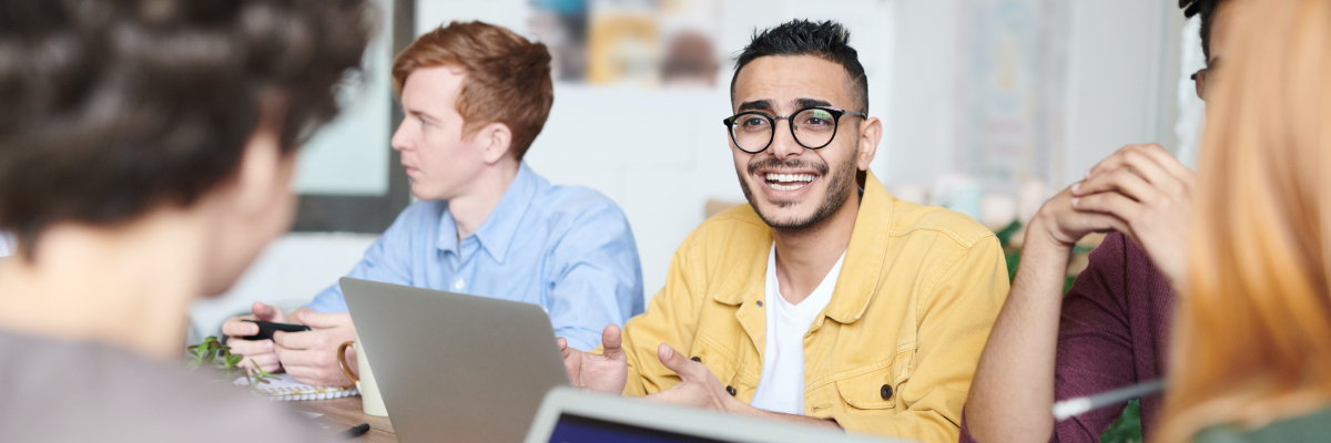 Image of two young men in work meeting